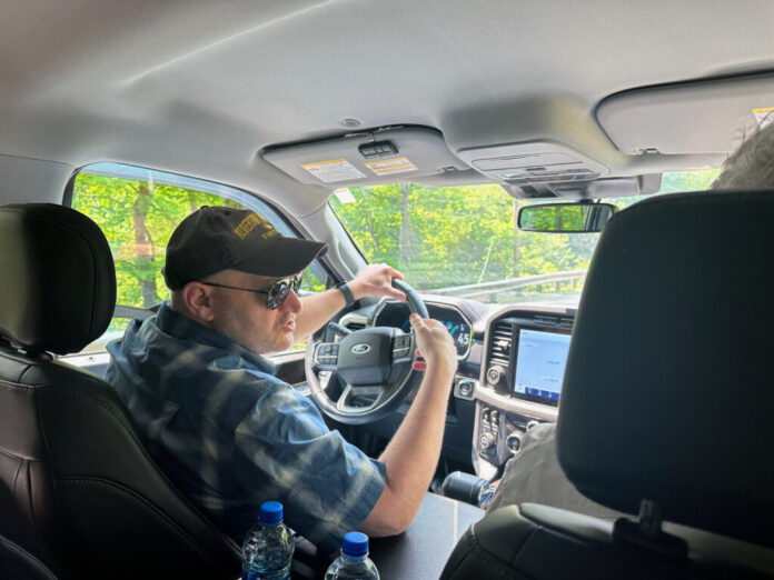 Hunter Mullens is pictured inside a vehicle
